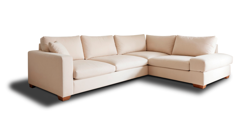 Hoekbank reinigen - crèmekleurige moderne hoeksofa voor diepe meubelreiniging aan huis.